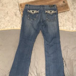 Earl jeans, size 11, descent condition some wear and tear at the bottom